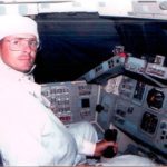 Early 1990's photo op in the cockpit of the Space Shuttle